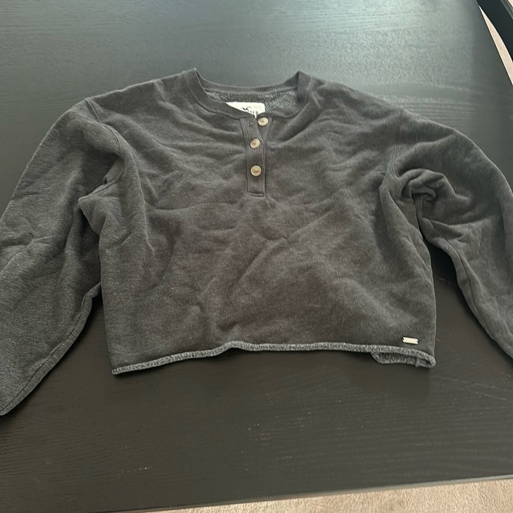 Hollister size small women’s crewneck dark gray with buttons quarter down.